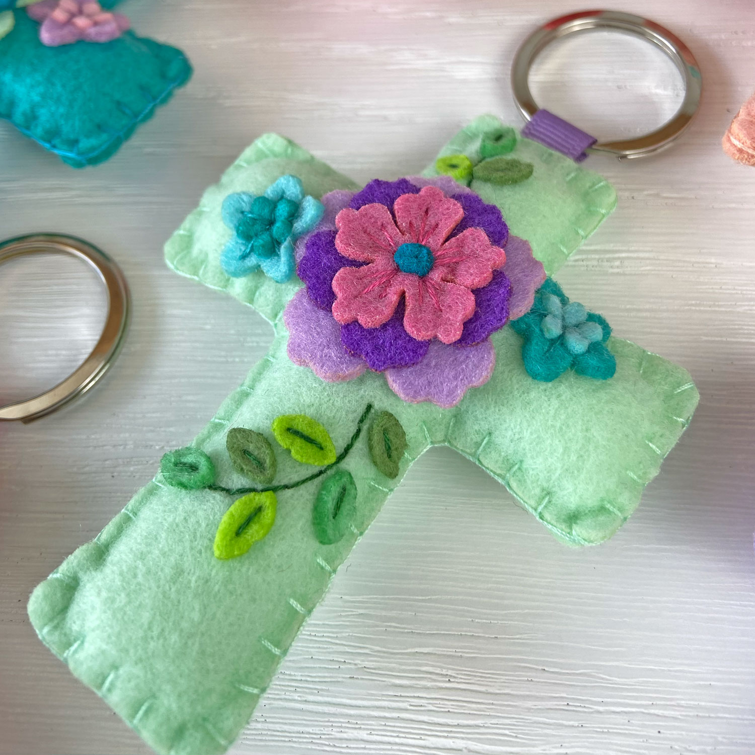 PI-LL-Cruz-menta Llavero cruz